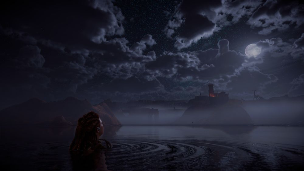 Aloy treading water in the middle of a lake while looking into the distance at the moon.