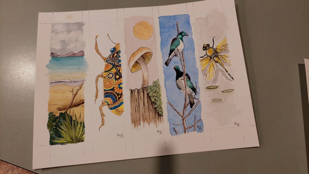 Five handpainted bookmarks - beachscape, half a colorful beatle,  mushroom on treestump, two kereru and a dragonfly 