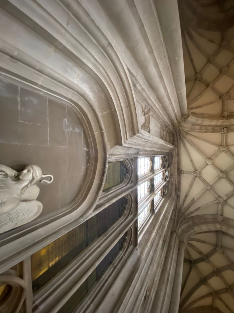 Spectacular distortion of gothic detail for an important military memorial in the nave side-aisle of Winchester Cathedral. 