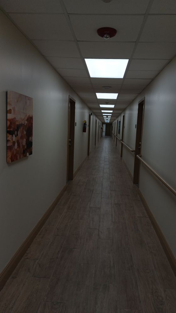 Long hallway that turns to lead to another long hallway...