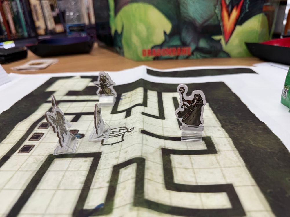 Let battle commence - minis in mid combat in a library
