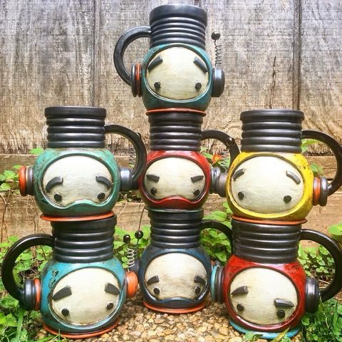 Colorful mugs with robot faces