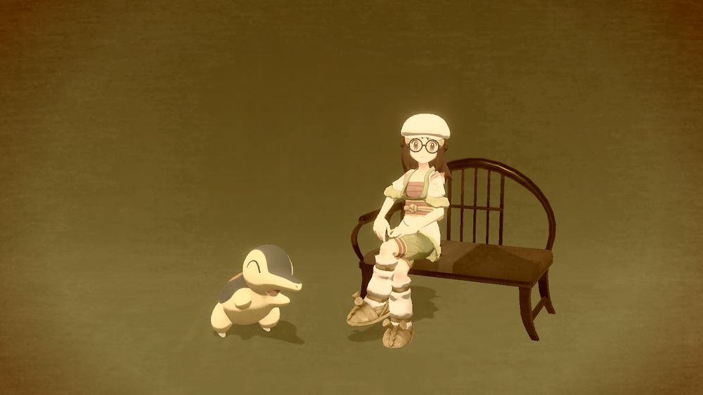 photo of my character in Pokémon Legends: Arceus posed with my Cyndaquil