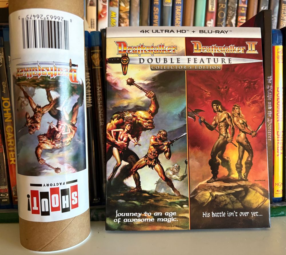 4K release of Deathstalker 1 and 2, next to an upside down tube holding a poster for the films.