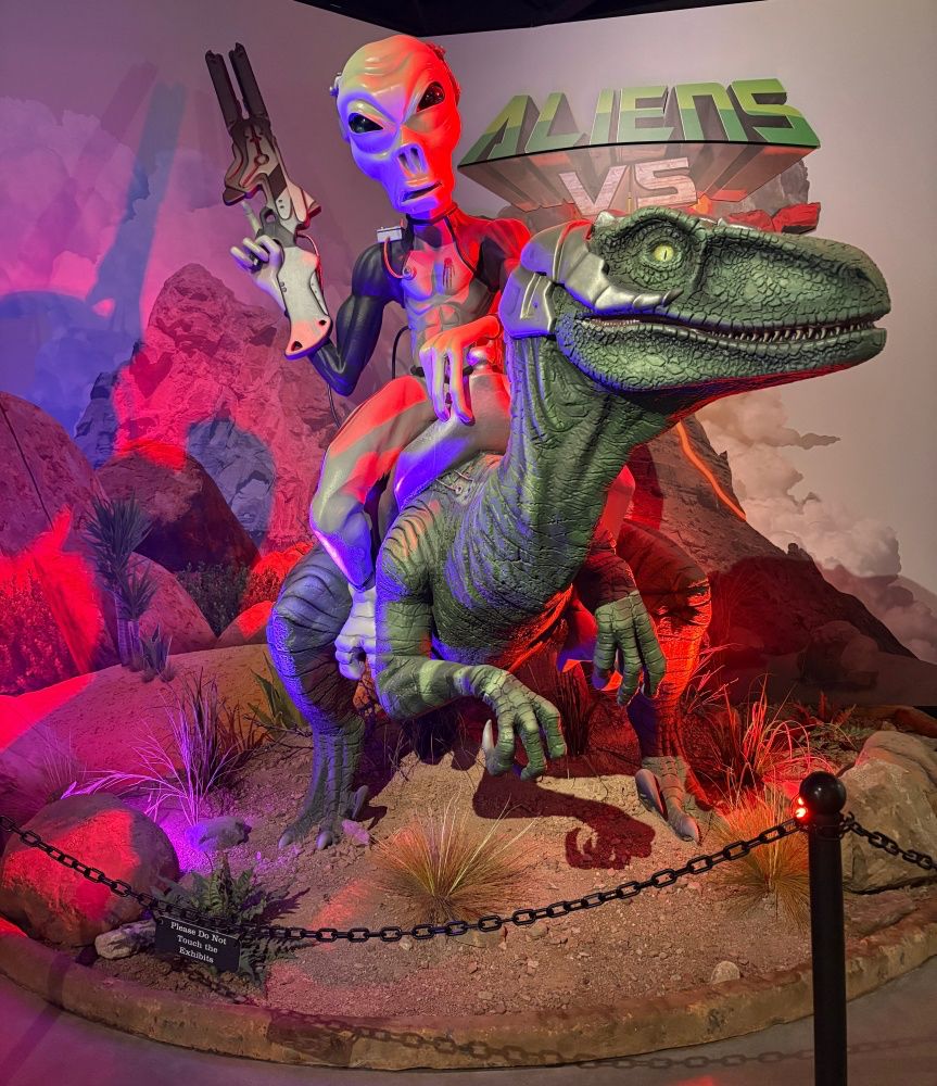 An Alien rides a Dinosaur at THE THING?