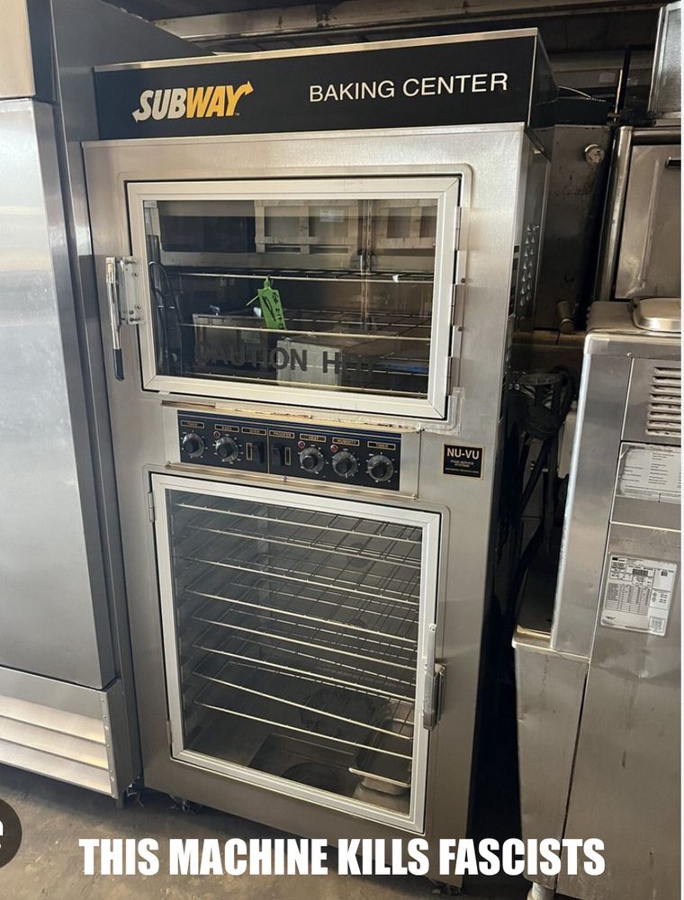 Photo of a Subway Sandwich Shop baking machine captioned with “This Machine Kills Fascists”