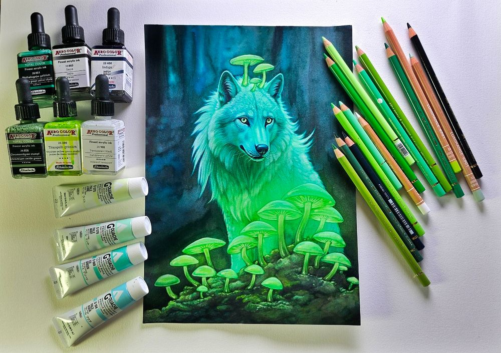 Painting of a white wolf with night-glowing mushrooms and some art supplies (colored pencils, ink, gouache) lying around.