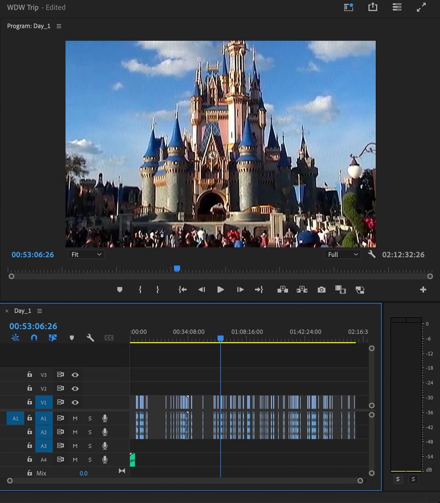 A screenshot of Adobe premiere. Cinderella’s castle is shown above a long and complex timeline