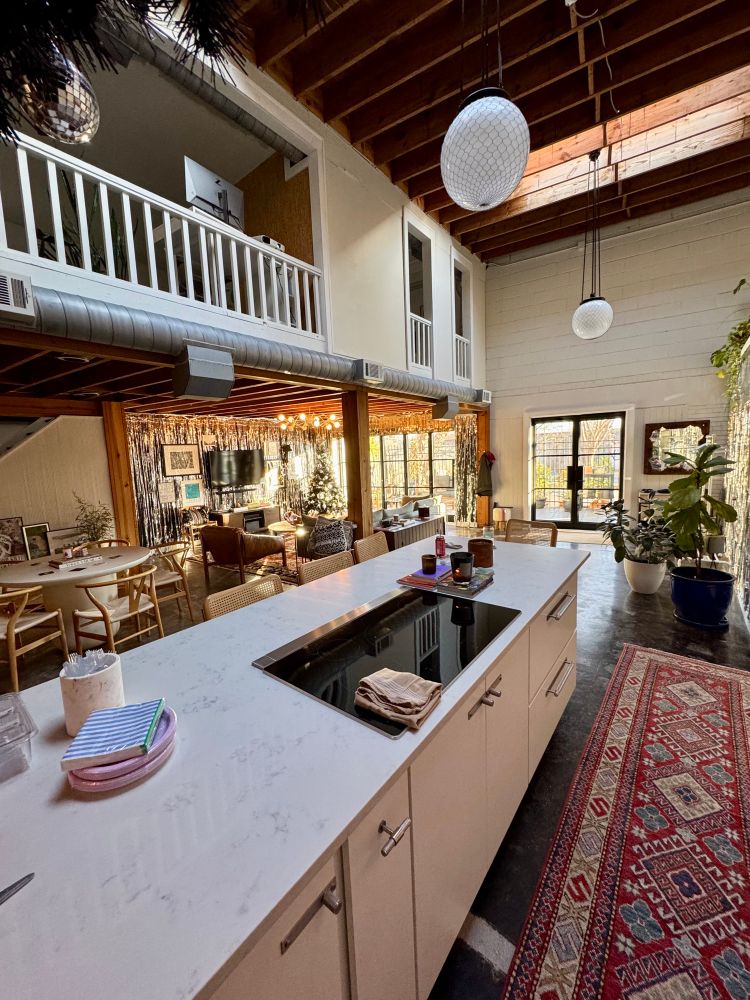 Pic of my loft from the kitchen, decorated for holiday party