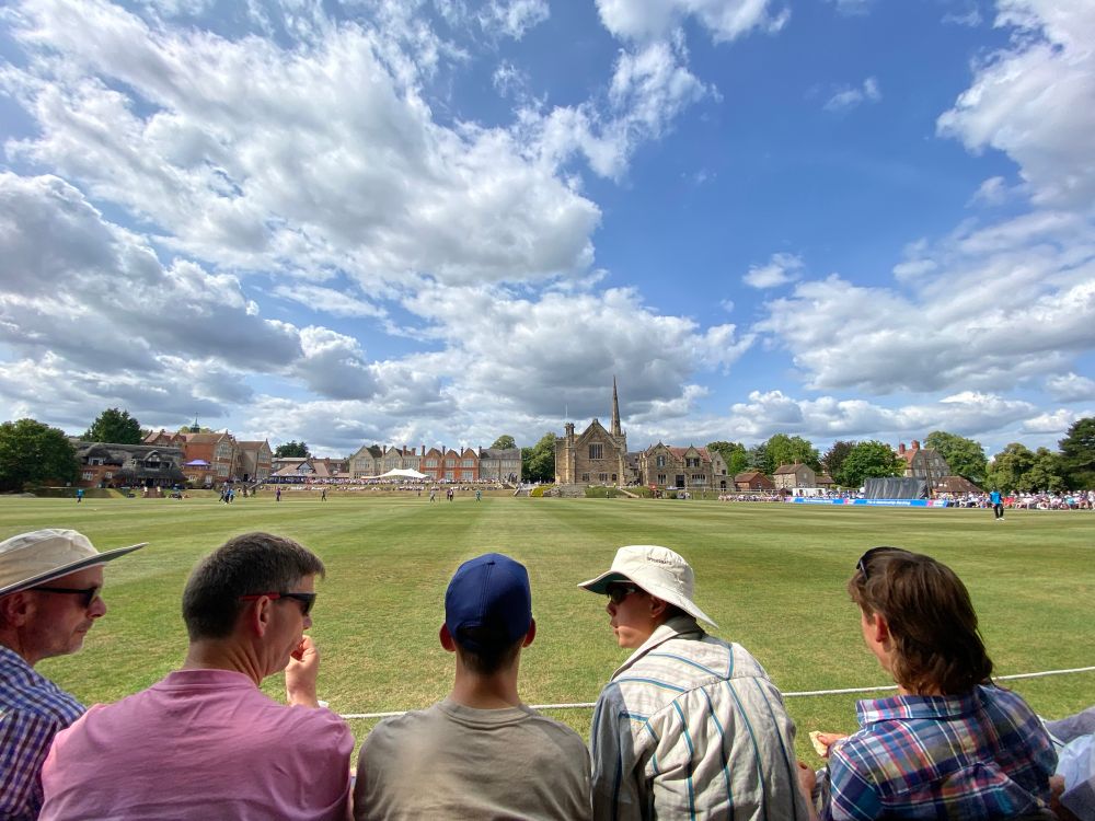 View of cricket fans watching Derbyshire bat against Worcestershire at Repton School in Derbyshire