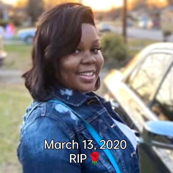 Picture of Breonna Taylor before she was murdered by police on March 13, 2020. Standing by car wearing a denim jacket.