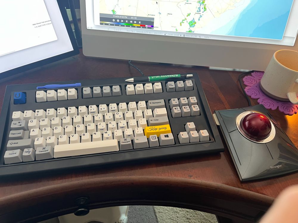 New trackball next to my new keyboard. Just showing the new setup. 