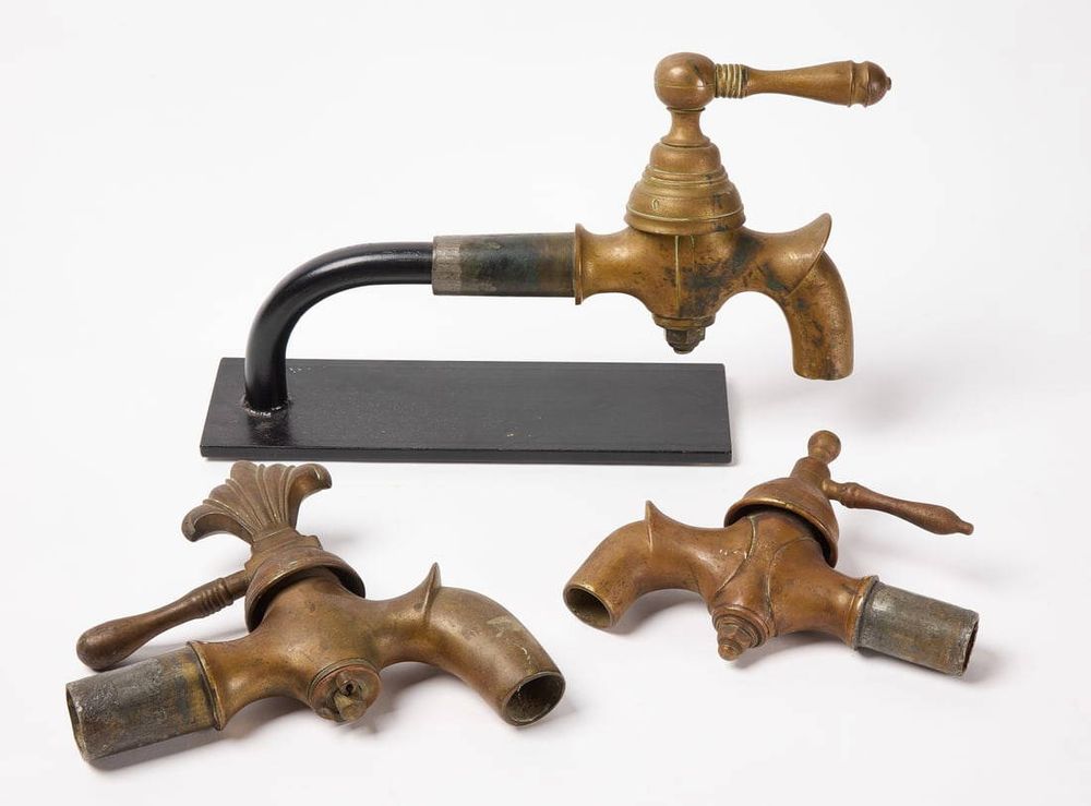Three brass spigots.