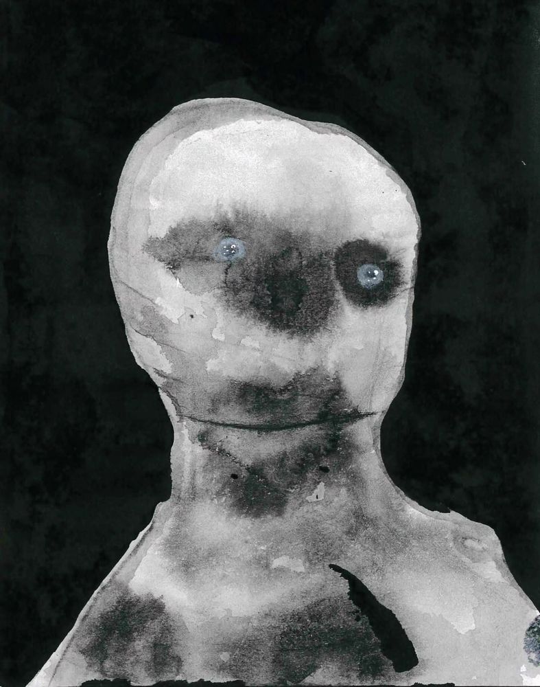 Ghostly head stares viewer with cloudy eyes