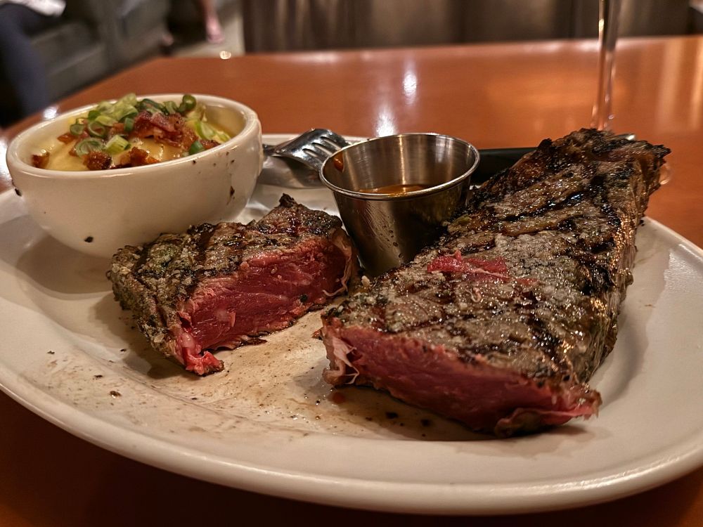 A cut-open steak that is most certainly not medium rare -- borderline blue.