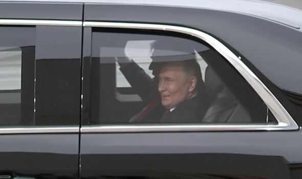 Putin and Trump ride in the US President's limo. Putin smiles.
Post reads: "Throw some Simon & Garfunkel on it, and it's the last scene in The Graduate." 