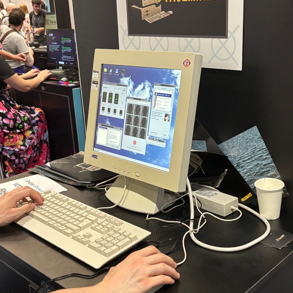 FACEMINER video game being played at the Develop:Brighton expo. The game is displayed on a vintage computer monitor.