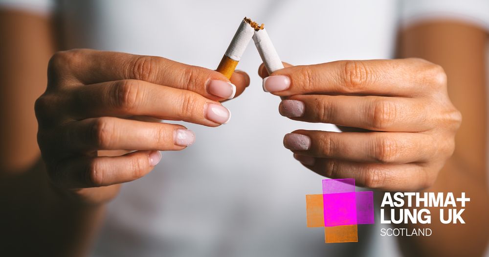 A woman is breaking a cigarette in half as she quits smoking. 