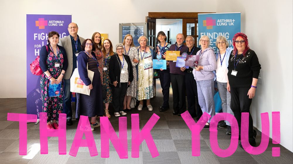 Group of Asthma + Lung UK Volunteers standing with their awards and certificates at the Volunteers Conference 2024. Pink text overlay ‘Thank you’ with Asthma + Lung UK logo.