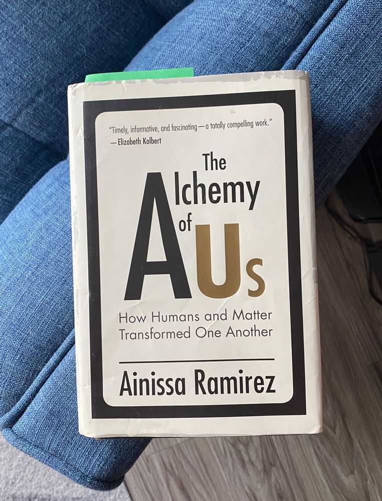 A picture of the book cover. “The Alchemy of Us.”
