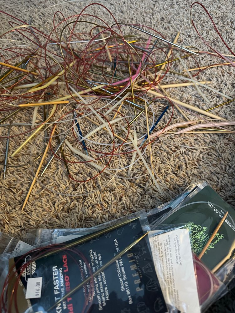 The “bad” knitting needles on the floor.