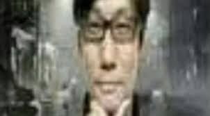 low res hideo kojima with his hand on his chin