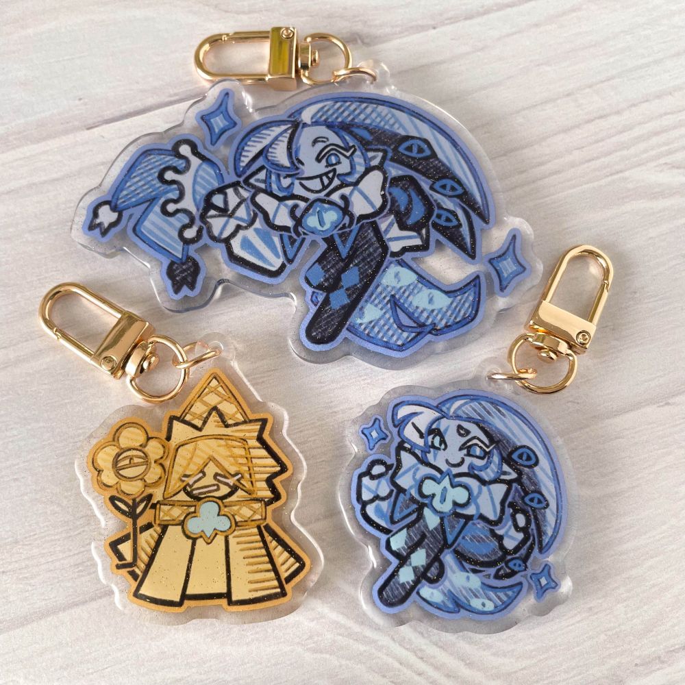 2-3.5" Glitter Acrylic Charms of Shadow Milk Cookie and Pure Vanilla Cookie from Cookie Run Kingdom