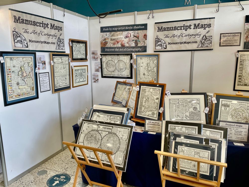 Manuscript Maps stall at Living North Live showing a variety of framed and map prints
