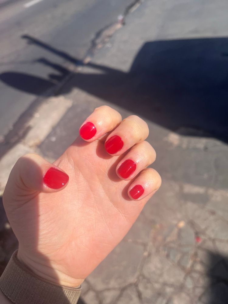 Showing off my red nail polish! Nails looking pretty short 