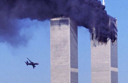 Plane flying into World Trade Center tower.