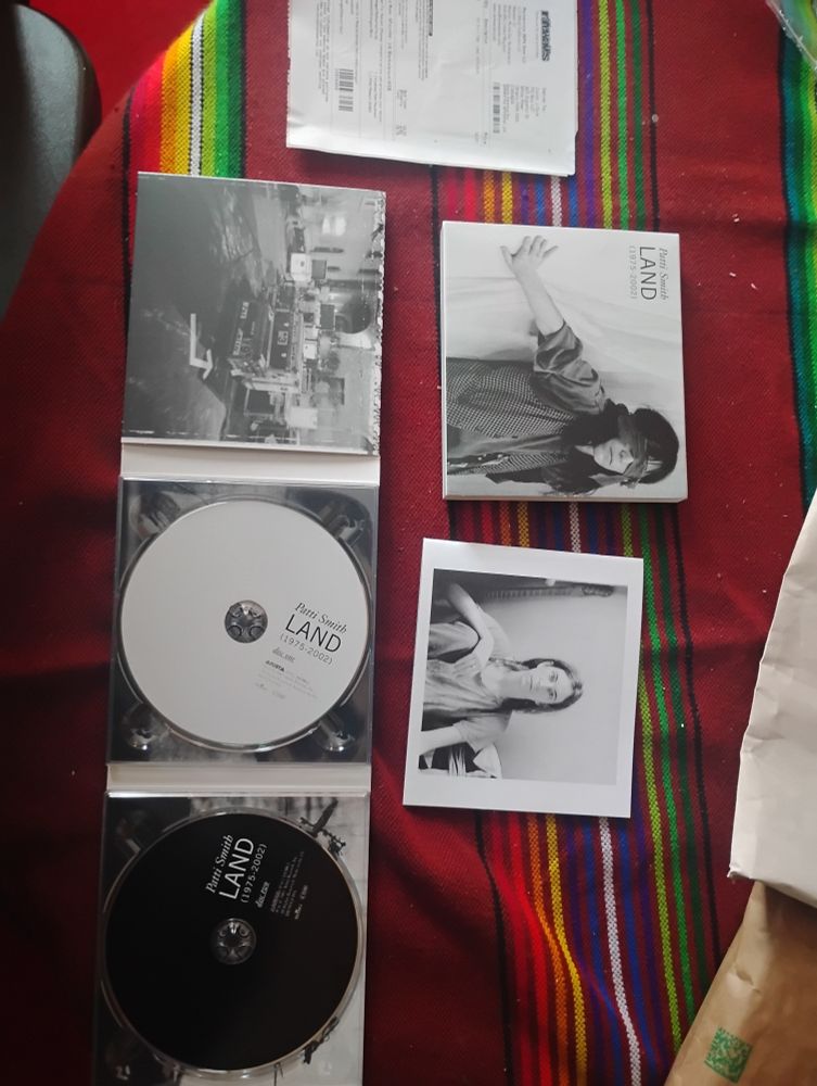 The Patti Smith album Land (2002).   She includes a book with writing and photos. She wrote that Disc one was chosen by you;  Disc 2 was chosen for you.  There are 17 songs on the first disc and 13 on the second.  Found it new online from Rarewaves, Northampton, UK.  I consider myself lucky to have seen her perform once by surprise in Ottawa.  The Sadies opened the show.  Patti Smith and her band was second.  The headliner was Neil Young and Crazy Horse.  