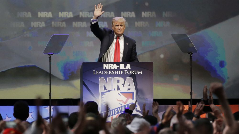 The president signed a measure into law that rescinds an Obama-era rule aimed at blocking gun sales to certain mentally ill people. The rule would have deemed about 75,000 people mentally incapable.