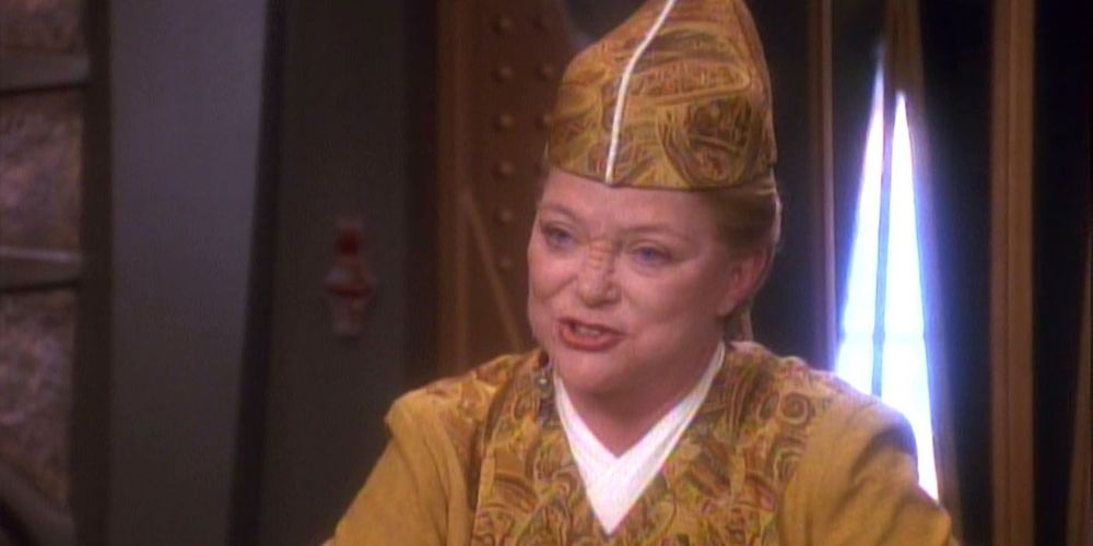 Kai Winn (Louise Fletcher) from Star Trek: Deep Space Nine, smiling.