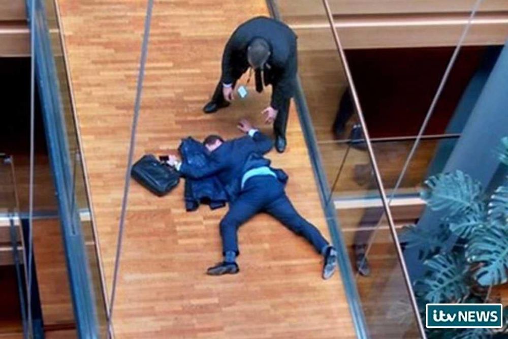UKIP MEP lies on floor having been punched by another one.