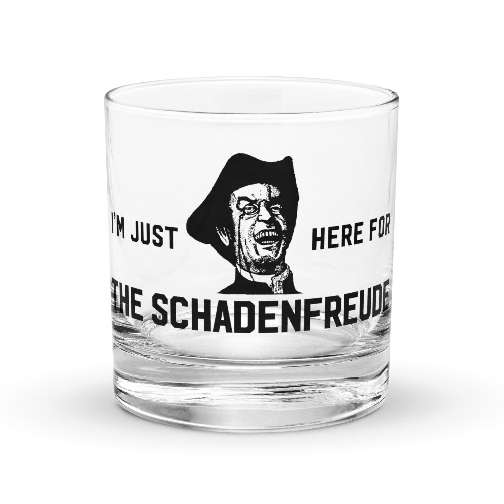 A glass with the image of a preacher laughing in spiteful satisfaction.  Caption reads:  "I'm just here for the Schadenfreude."