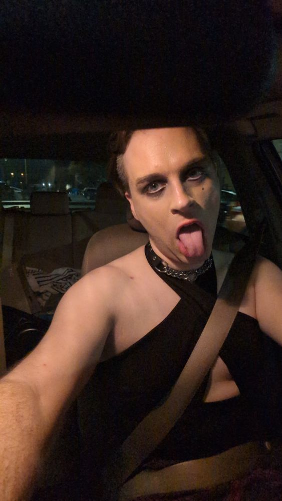 me in a car in a black halter top