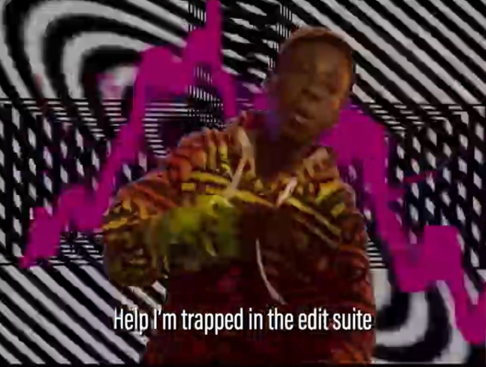 Subtitles reading “Help! I’m trapped in the edit suite.”