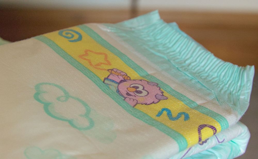 A close-up shot of one of the diapers. The texture of the velcro landing zone is visible and giving me a lot of nostalgia.