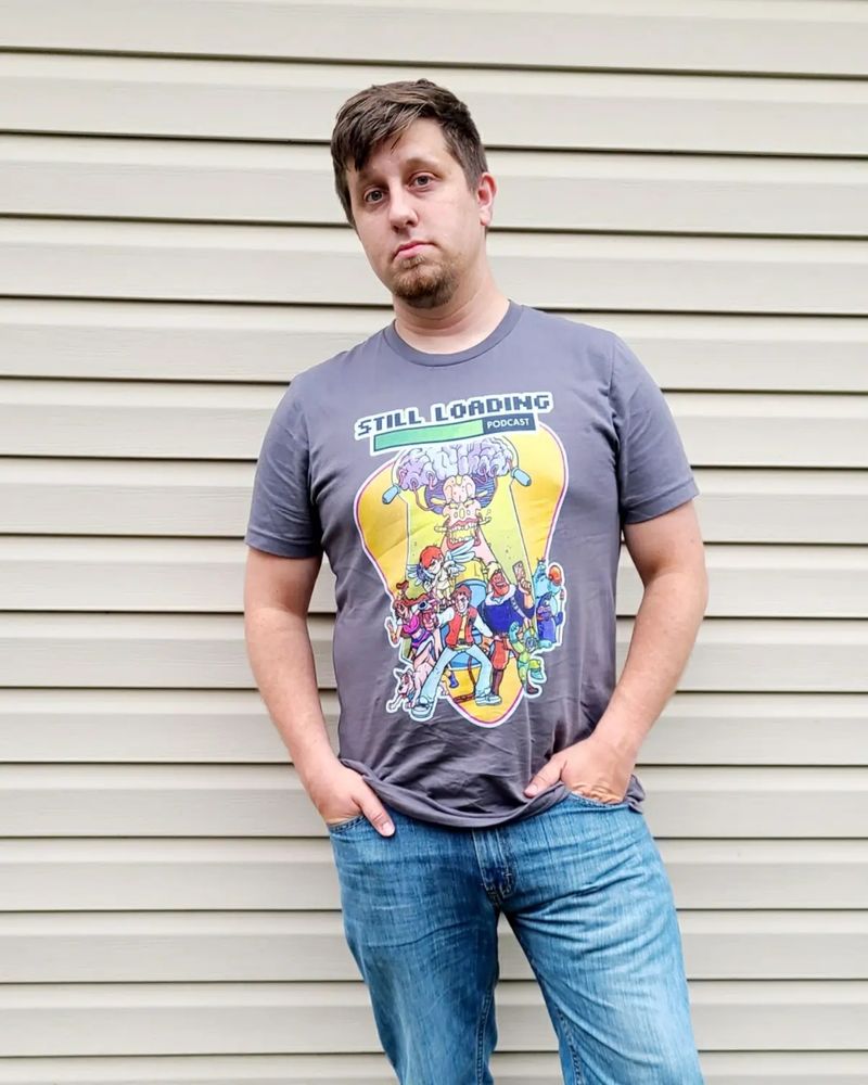 Me pretending to be a model in a Captain N Still Loading shirt.