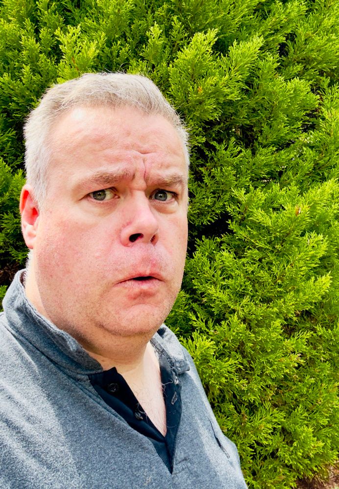 A tired, overweight man.