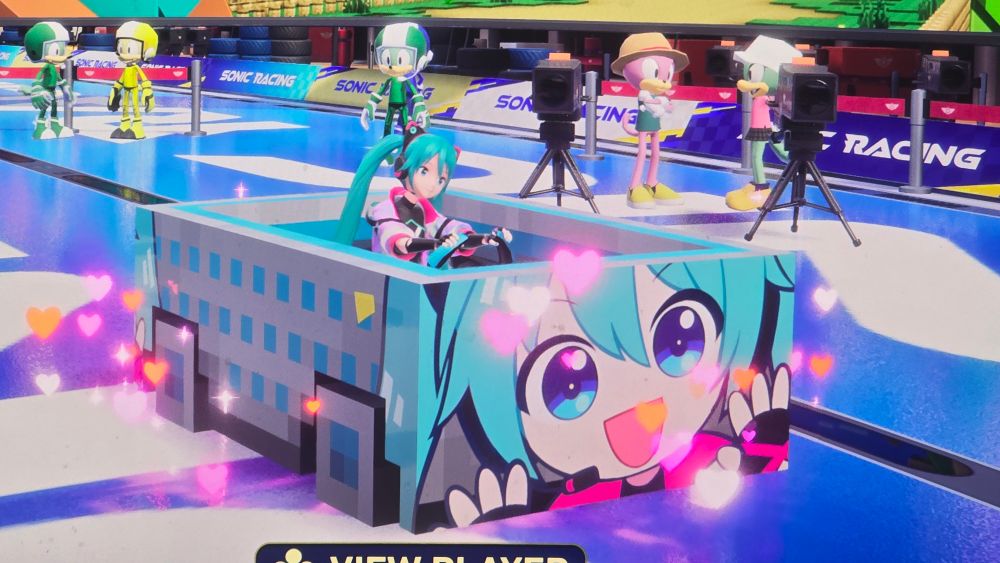 Sonic Racing Crossworlds. Hatsune Miku riding in the minecraft car with a giant Hatsune Miku sticker on the front.
