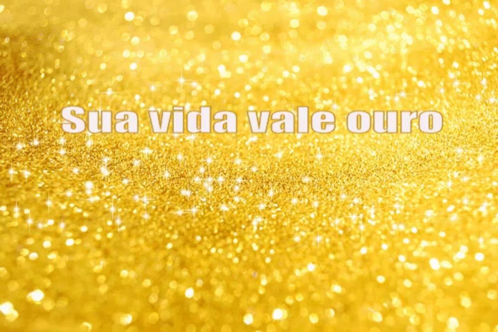 a yellow background with the words sua vida vale ouro