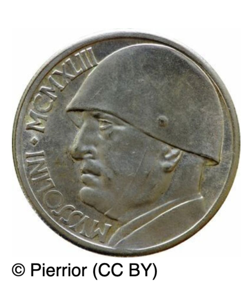 Italian 20-lira coin with a profile portrait of Benito Mussolini.