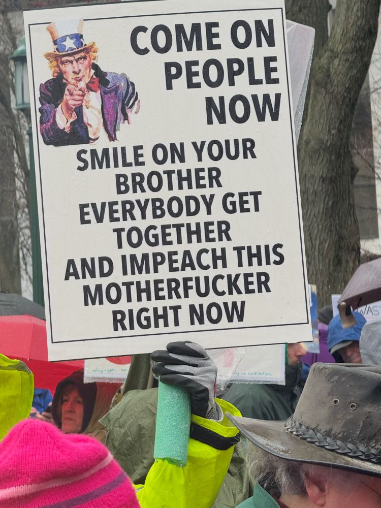 Protest sign at Albany Hands Off Rally