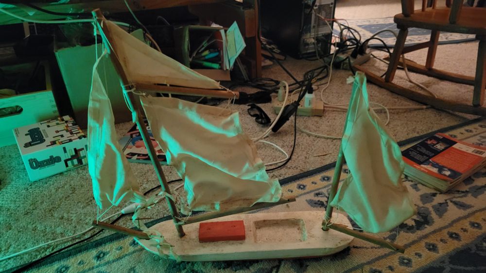 Model of the boat from the edutainment series Voyage of the Mimi