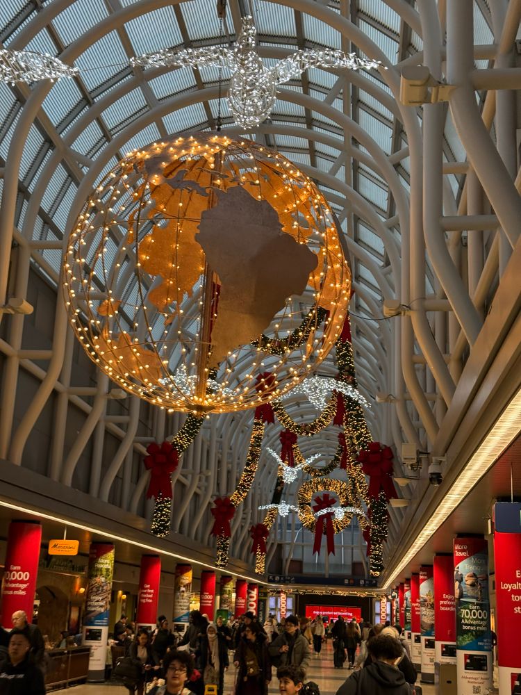Lighted globe and holiday decorations along Terminal 3 in Chicago