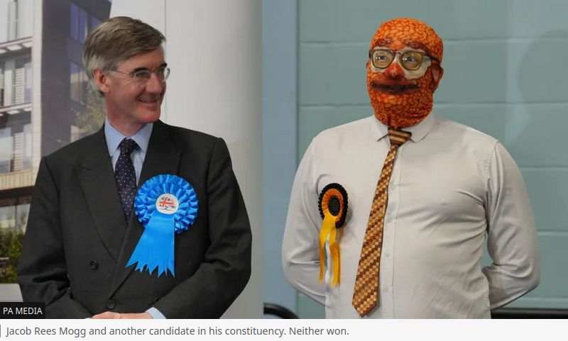 Jacob Rees-Mogg and Monster Raving Loony candidate Barmy Brunch captioned "Jacob Rees Mogg and another candidate in his constituency. Neither won."