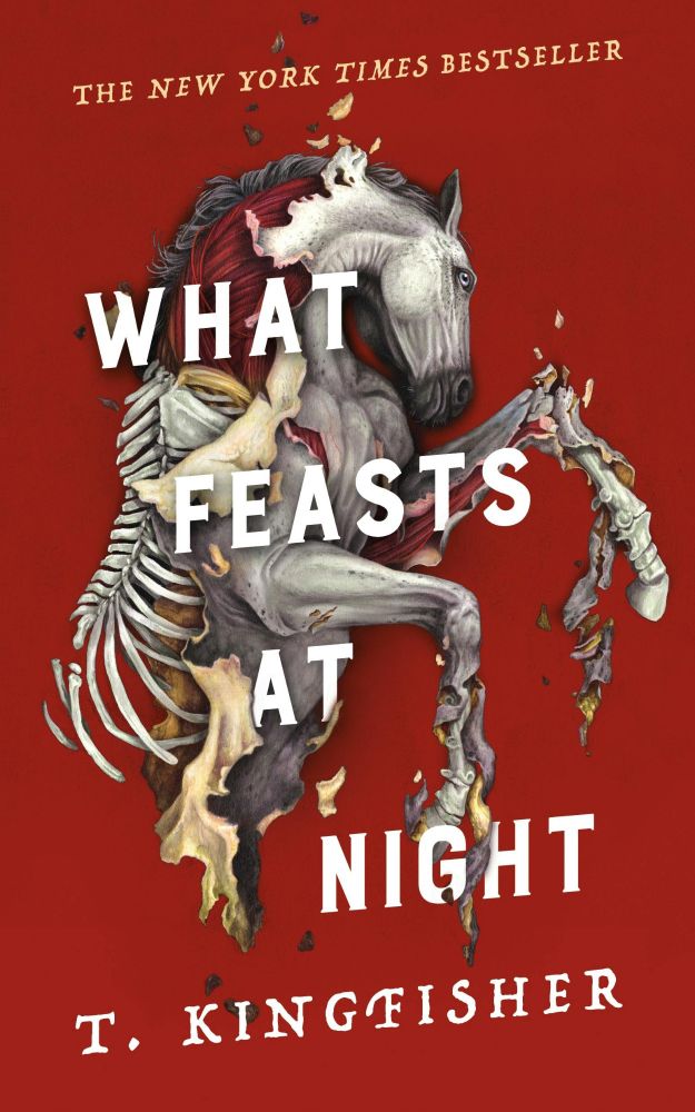 Red background with the top half of a decaying horse. Title above the horse reads "The New York Times best seller" . Big white words on the horses read "What Feasts at Night" and bellow the horse reads "T. Kingfisher" 