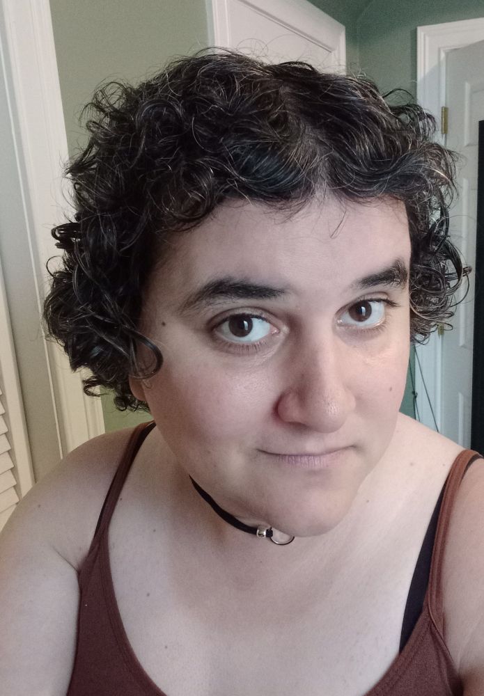 selfie of me wearing a brown camisole 
