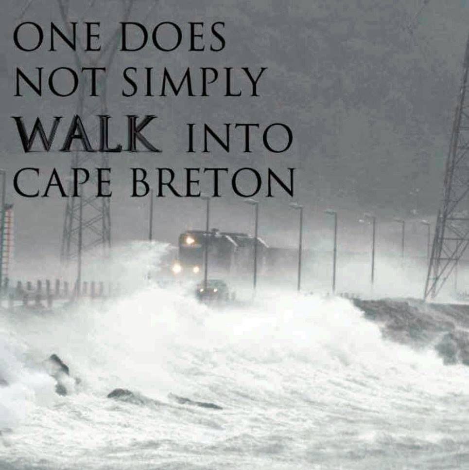 A picture of a train crossing the Cando Causeway in a storm. With waves breaking over the train and a car and the text: “one does not simply walk into Cape Breton”